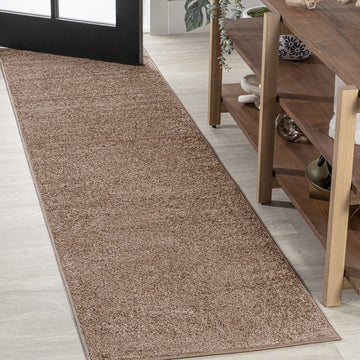 Haze Solid Low-Pile Area Rug Brown